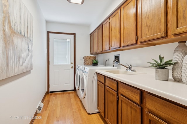 1109 E Gartner Rd, Naperville, IL 60540 - laundry room with cabinet space, washer and dryer, and light wood-style floors