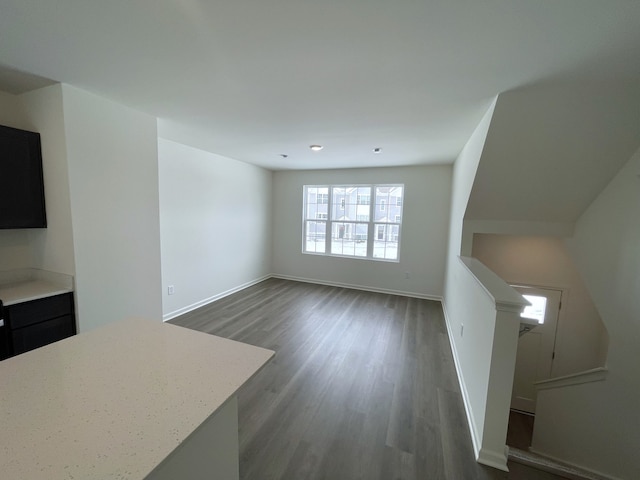 living room with wood finished floors and baseboards