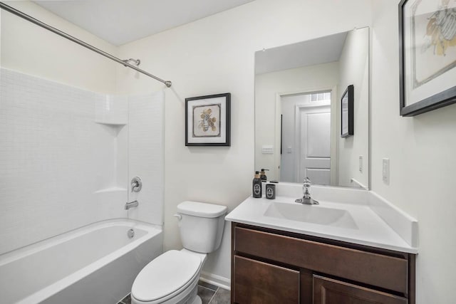 bathroom featuring bathtub / shower combination, vanity, and toilet