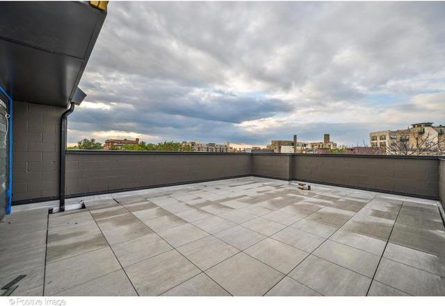 view of patio featuring a view of city