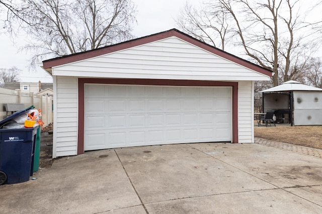 detached garage with fence