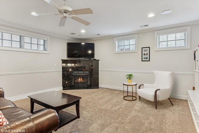 1307 W Wellington Ave, Chicago, IL 60657 - carpeted living area with ornamental molding, a high end fireplace, baseboards, a ceiling fan, and recessed lighting