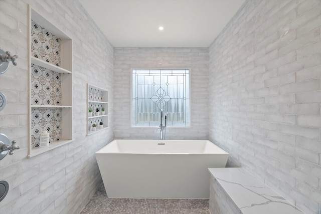 full bathroom with a freestanding tub