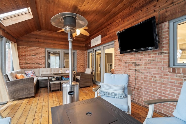 deck with ceiling fan and an outdoor hangout area