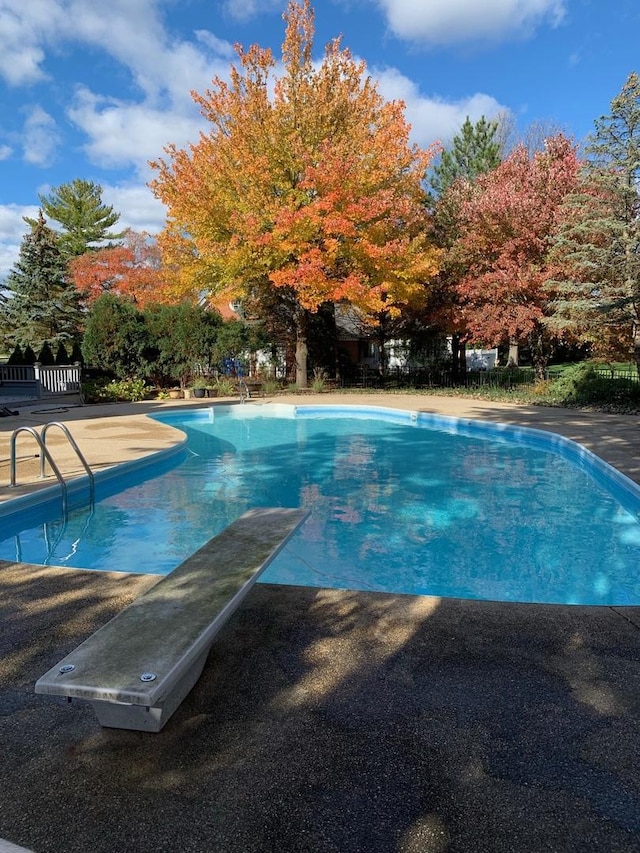 pool with a patio