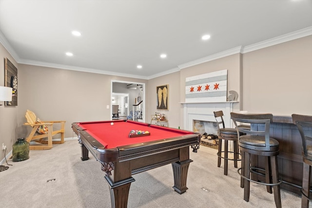 game room featuring light carpet, recessed lighting, a fireplace, and crown molding