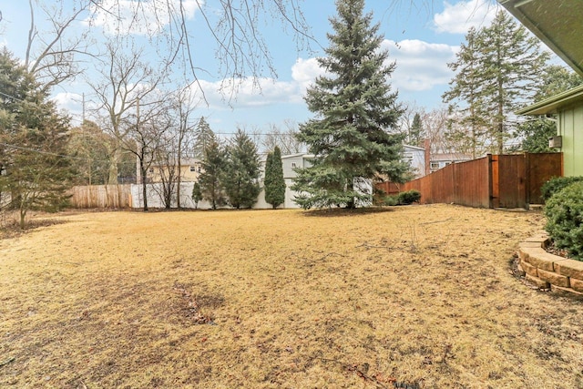 view of yard with fence