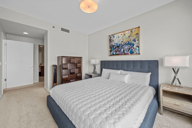 bedroom with carpet flooring and visible vents