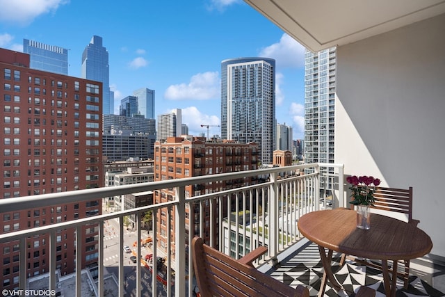 balcony featuring a city view