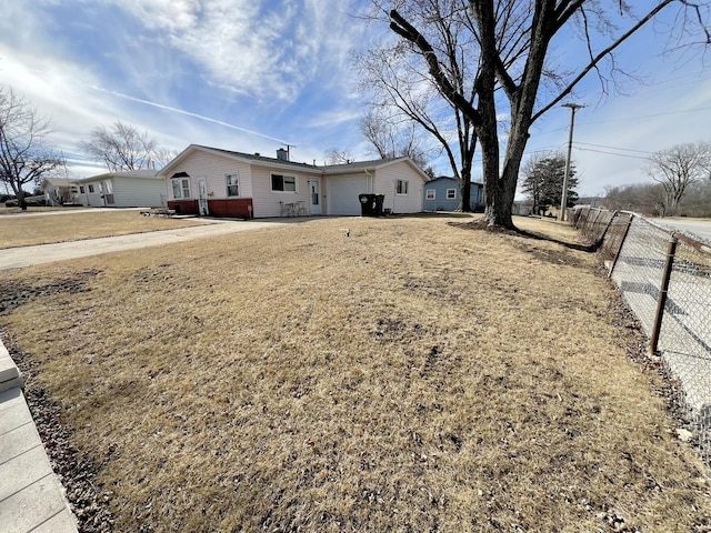 view of yard with fence