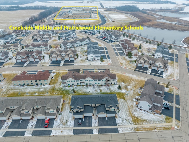 birds eye view of property with a residential view