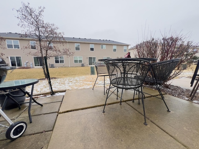 view of patio featuring outdoor dining area