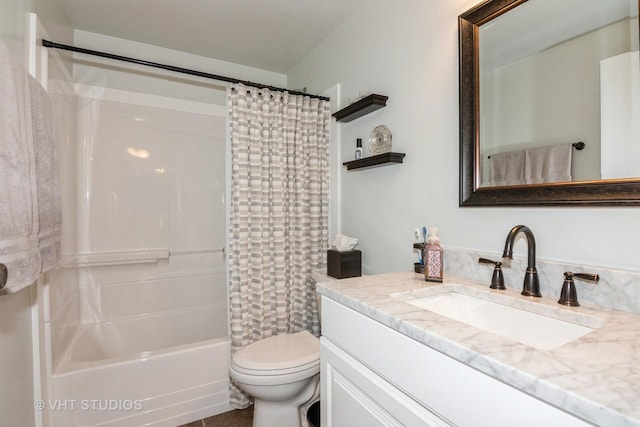 full bath with toilet, vanity, and shower / bathtub combination with curtain