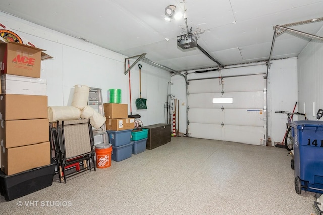 garage featuring a garage door opener