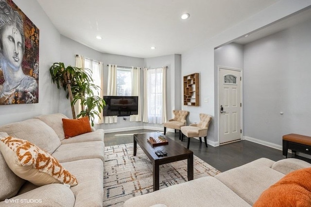 4904 W Fulton St, Chicago, IL 60644 - living room with dark wood finished floors, recessed lighting, and baseboards