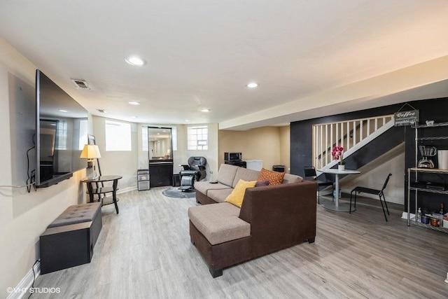 4904 W Fulton St, Chicago, IL 60644 - living area featuring light wood-type flooring, stairs, recessed lighting, and baseboards