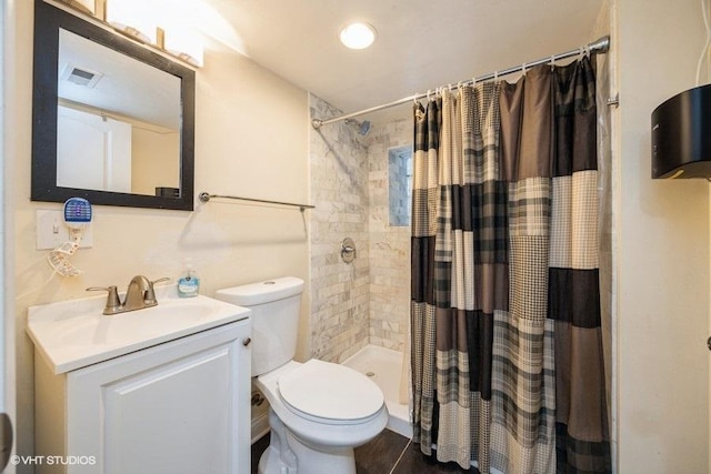 4904 W Fulton St, Chicago, IL 60644 - bathroom with toilet, vanity, and tiled shower