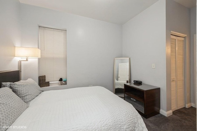 4904 W Fulton St, Chicago, IL 60644 - carpeted bedroom featuring a closet and baseboards
