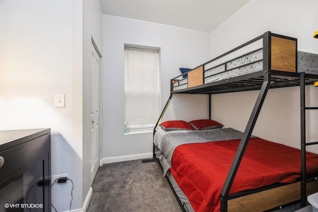 4904 W Fulton St, Chicago, IL 60644 - carpeted bedroom featuring baseboards