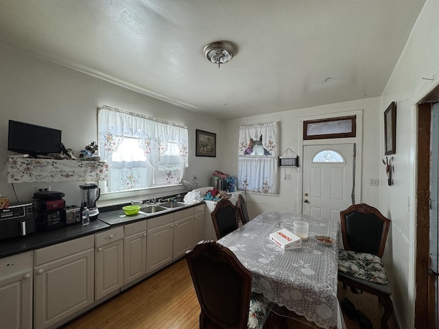 dining room featuring light wood finished floors