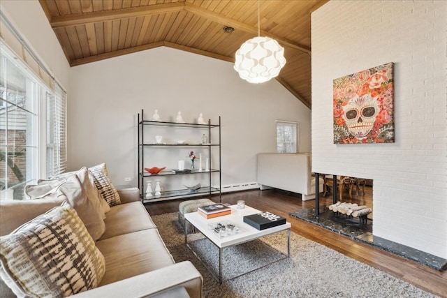 living area with lofted ceiling with beams, wooden ceiling, wood finished floors, baseboard heating, and a fireplace