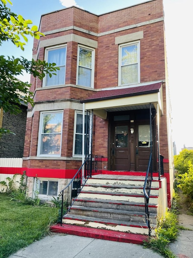 view of front of property with brick siding