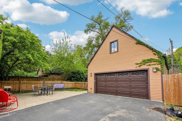 detached garage with fence