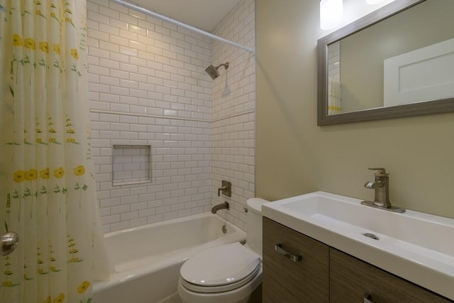 full bathroom with shower / tub combo, vanity, and toilet