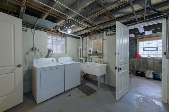 washroom featuring laundry area and washer and clothes dryer