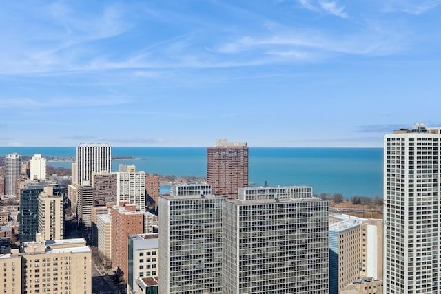 property's view of city with a water view