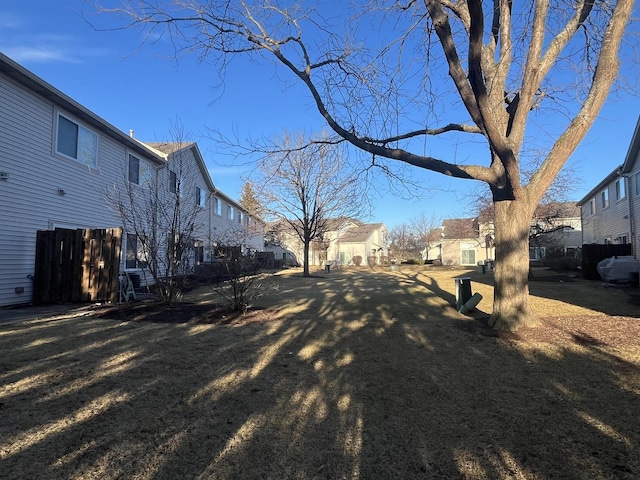 view of yard featuring a residential view