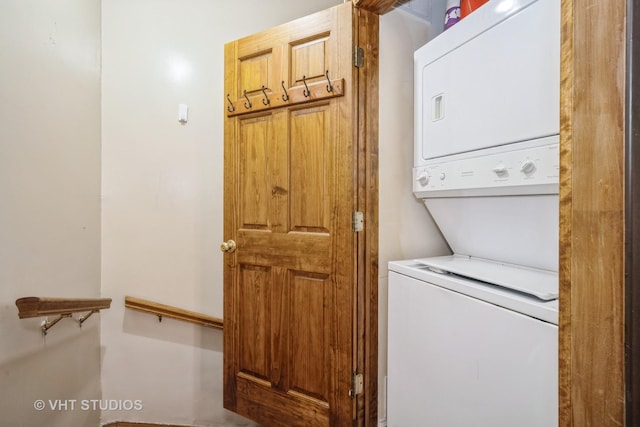 laundry area with laundry area and stacked washer and dryer