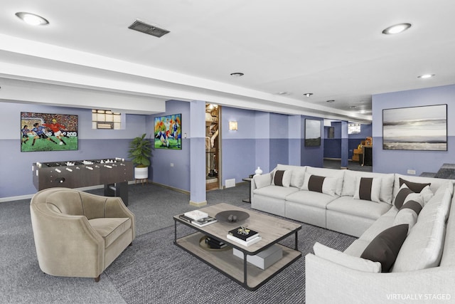 carpeted living room featuring baseboards, visible vents, and recessed lighting