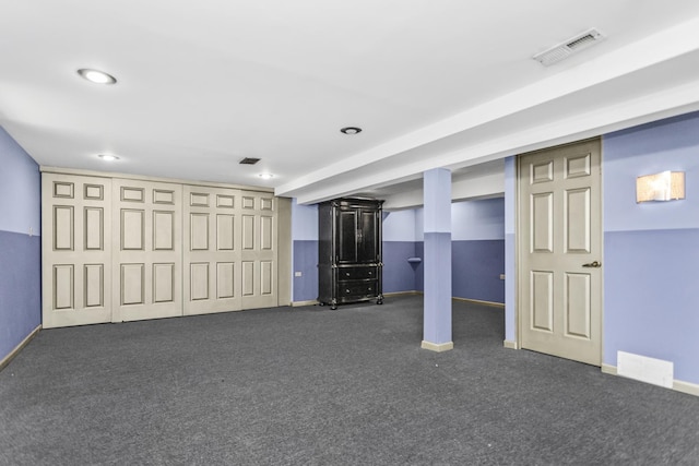 unfurnished bedroom featuring carpet, visible vents, and baseboards