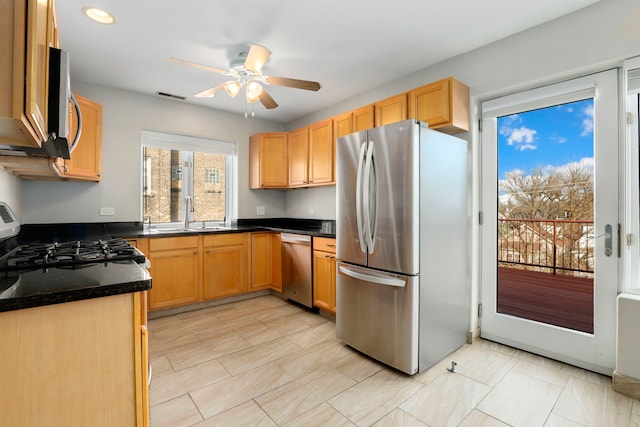 kitchen featuring visible vents, a ceiling fan, a sink, recessed lighting, and appliances with stainless steel finishes