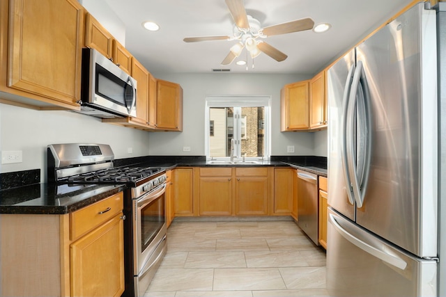 kitchen with visible vents, ceiling fan, recessed lighting, stainless steel appliances, and a sink