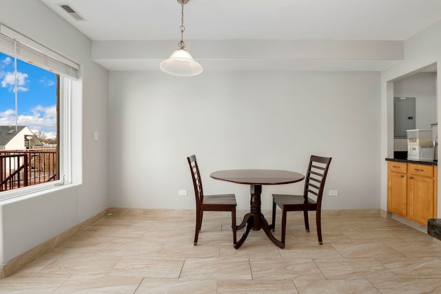 dining space featuring visible vents