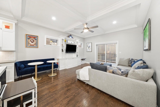 living room with coffered ceiling, ceiling fan, dark wood-type flooring, crown molding, and beam ceiling