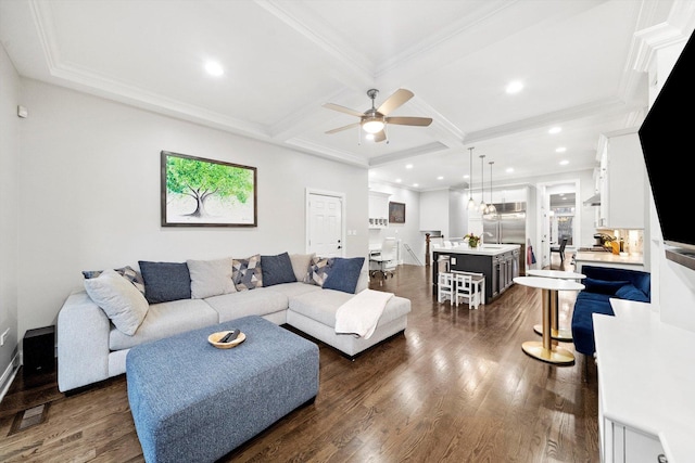 living area with beam ceiling, recessed lighting, dark wood-type flooring, ornamental molding, and coffered ceiling