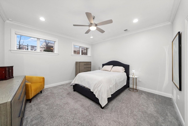 bedroom with baseboards, carpet flooring, visible vents, and crown molding