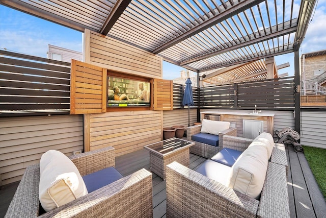 wooden deck with outdoor lounge area and a pergola