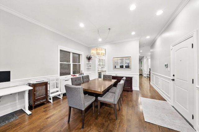 dining area with dark wood-style floors, recessed lighting, a wainscoted wall, and ornamental molding