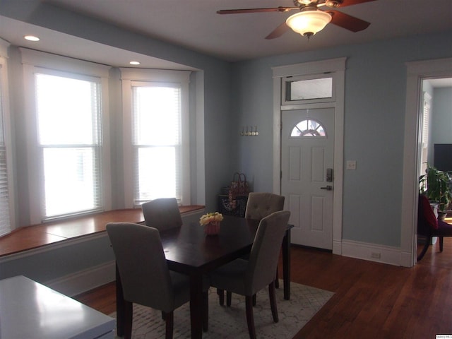 dining space with ceiling fan, baseboards, wood finished floors, and recessed lighting