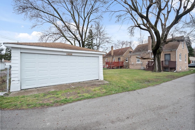 detached garage with a residential view