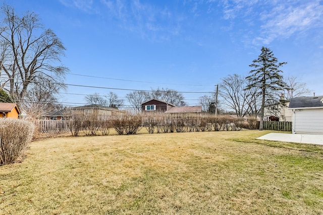 view of yard featuring a patio area and fence