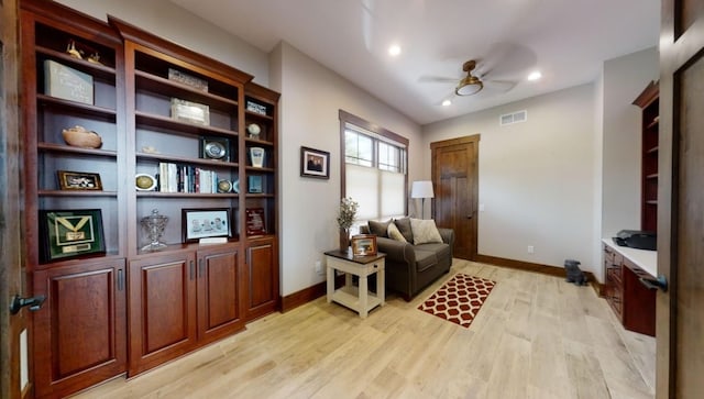 sitting room featuring light wood finished floors, recessed lighting, visible vents, a ceiling fan, and baseboards