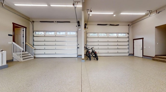 garage featuring baseboards