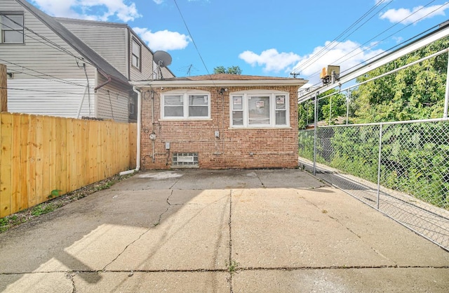 view of patio featuring fence