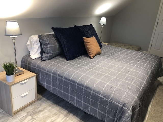 bedroom with light wood-style flooring
