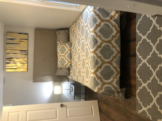 unfurnished bedroom with wood finished floors